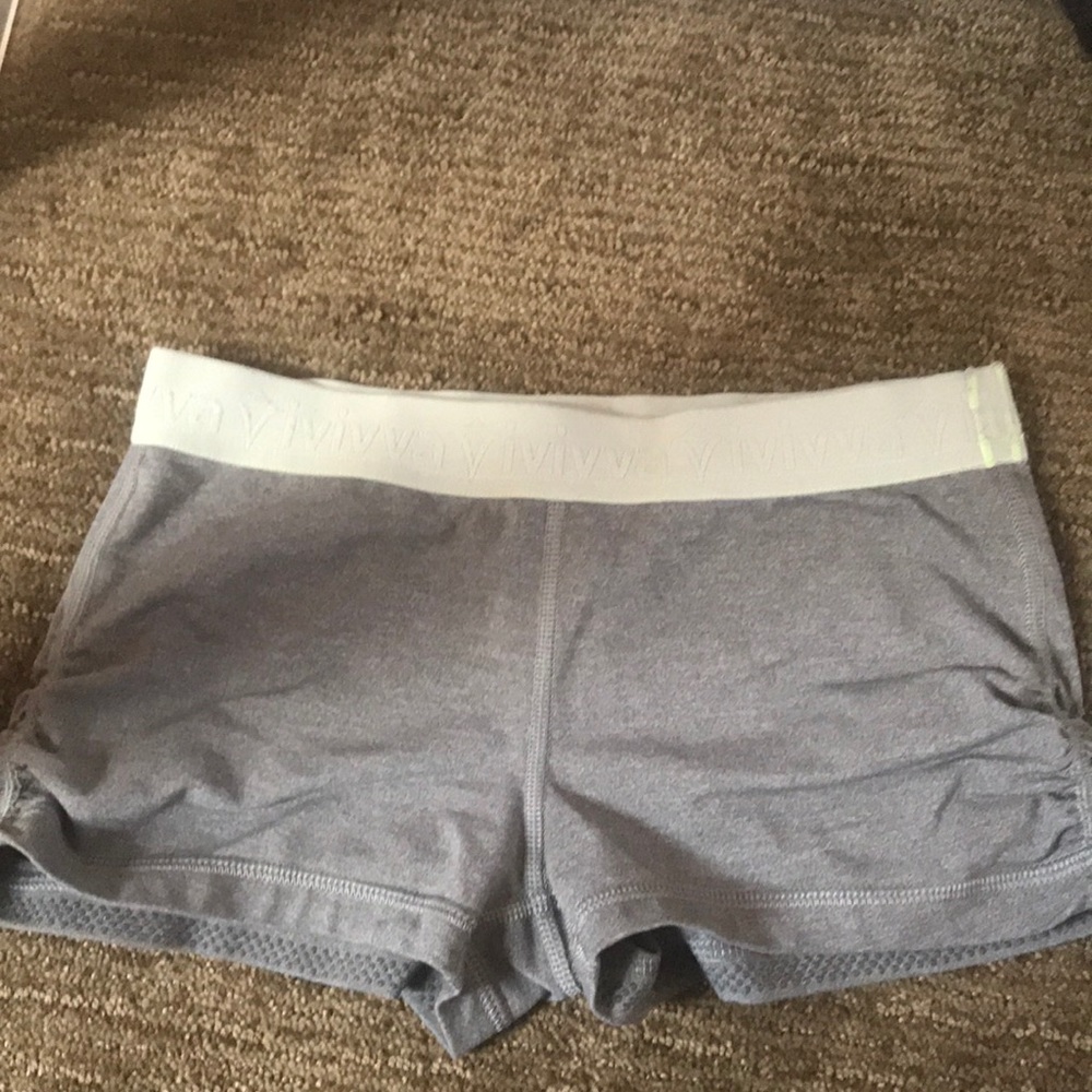 Grey ivivva spandex with light green trim